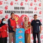 PENGURUS PMI KALTARA MENYERAHKAN AIR MINERAL & MONITORING POS SIAGA LEBARAN 2026